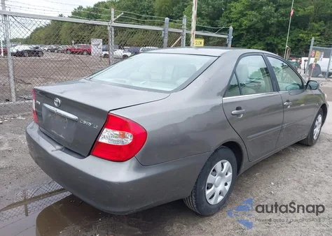 2003 Toyota Camry Le z USA, uszkodzony, nr VIN 4T1BE32K03U721258